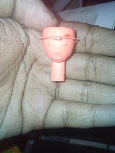Vintage Toy Character with Wheels