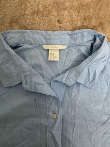 Light Blue Sleeveless Collared Shirt