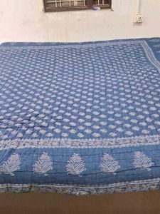 Blue Patterned Quilt Wait 1.850