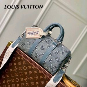 *Louis Vuitton Monogram  washed Denim Keepall Band