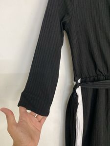 Chic Black Jumpsuit with White Stripes