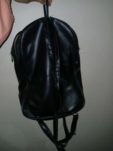 Black PU / Faux Leather with inner fabric lining