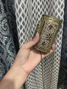 Elegant Gold Embellished Clutch Bag