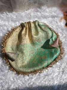 brocade pastel color potli bag