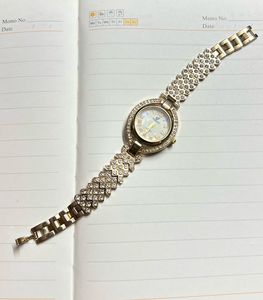 Elegant Gold Watch with Rhinestones