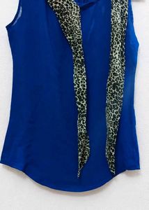 Stylish Blue Sleeveless Top with Scarf Detail