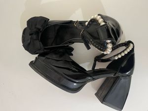 Elegant Black Bow &amp; Pearl Heels