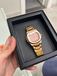 Elegant Rose Gold Watch with Pink Dial