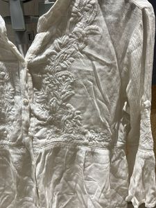 White Embroidered Peplum Top