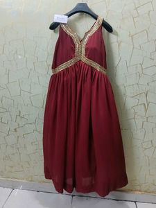 Elegant Red Gown with Gold Embellishments