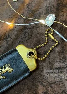 Coach Black Leather Handbag with Charm