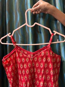 red printed peplum cami top