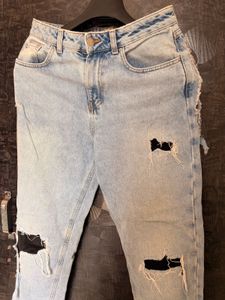 ripped boyfriend jeans