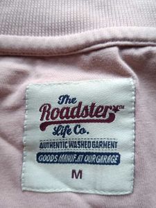 Pink Polo Shirt with Sailboat Pattern