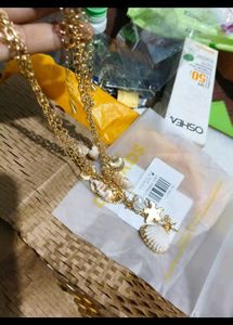 Boho Seashell Layered Necklace and rings from sava
