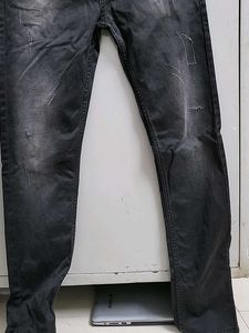 Distressed Black Denim Jeans