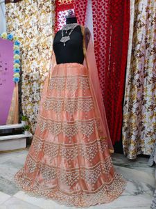 Stunning Peach Embroidered Lehenga Choli