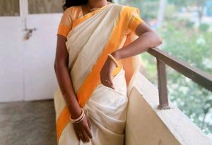 South Style Cream and Orange Saree