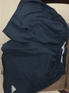 A Navy blue Adidas sports shorts