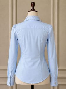 Elegant Blue Blouse with Embellished Collar