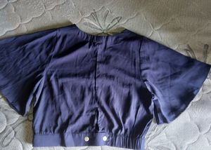Blue Top With Flared Sleeves..