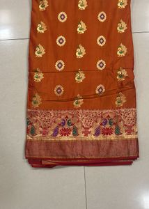 Paithni Orange Saree with Embellished Blouse