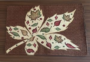 Set of 4 jacquard leaf-patterned placemats