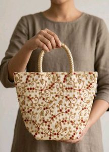 Stunning cream golden coloured handbag