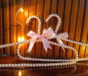 Elegant Pearl Hangers with Bow Accents