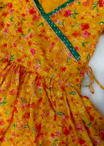 Yellow Floral Lehenga Choli with Pom-Pom Tassels