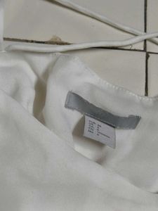 White Sleeveless Top