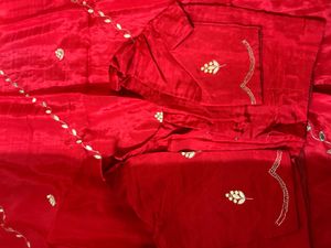 Vibrant Red Silk Saree with Embellishments