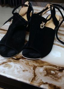 Black velevt footwear