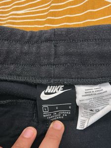 dark grey Nike joggers