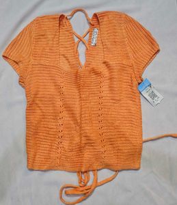 Orange knitted cropped top