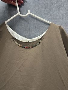 olive and white top
