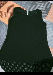 Chic Black Sleeveless Top with Polka Dot Hem