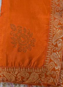 Stunning Orange Saree with Gold Border
