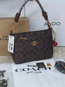 Coach Signature Brown  with cherry charm 🍒