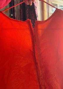 Flowing Orange Ethnic Skirt with choli and jacket