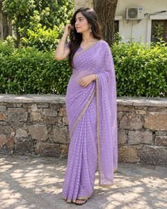 Elegant Lavender Saree with Gold Motifs