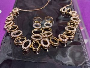 Dangling Oval Earrings with Stones (rose gold )