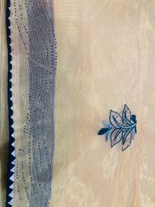 Elegant Embroidered Cream Saree