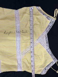 Elegant Yellow Striped dress with Lace Detail