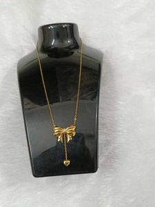 Chic Gold Bow & Heart Necklace