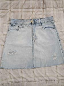 Light Wash Ripped Denim Mini Skirt