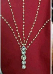 Elegant Pearl and Crystal Headpiece