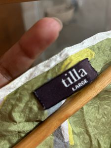 Top Tila