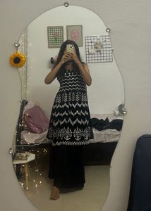 Elegant Black Kurta Set with Intricate Detailing