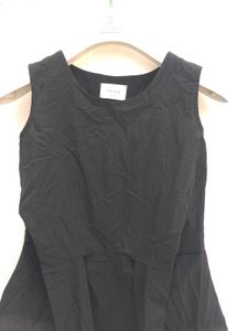 Chic Black Sleeveless Peplum Top